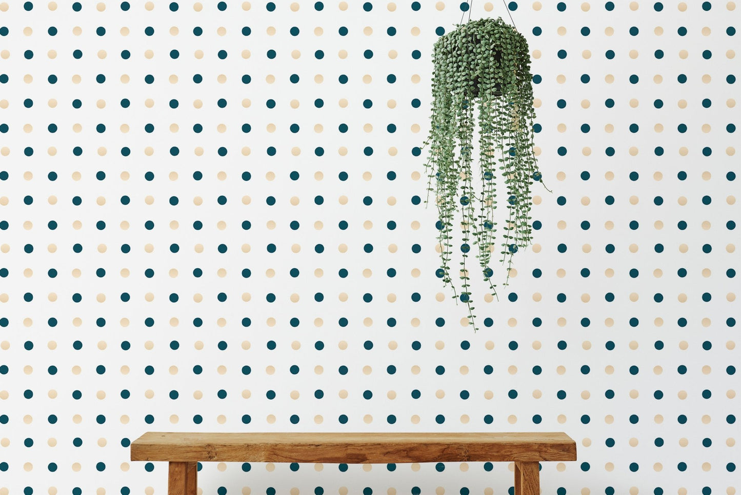 White wallpaper with small blue and yellow dots behind a wooden bench.