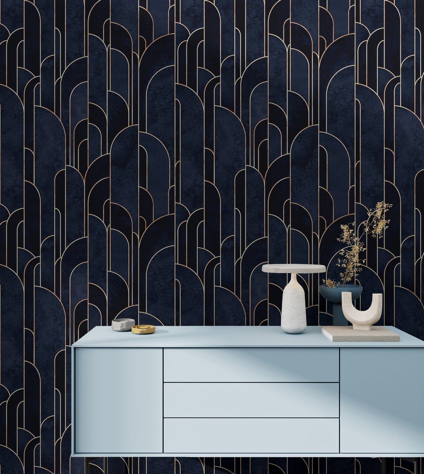 Dark Blue Art Deco wallpaper behind a light blue sideboard cabinet.