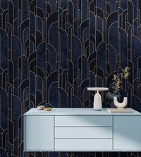 Dark Blue Art Deco wallpaper behind a light blue sideboard cabinet.