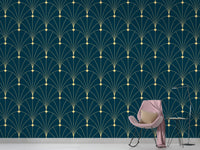 Modern geometric deco wallpaper behind a pink velvet chair and small side table.