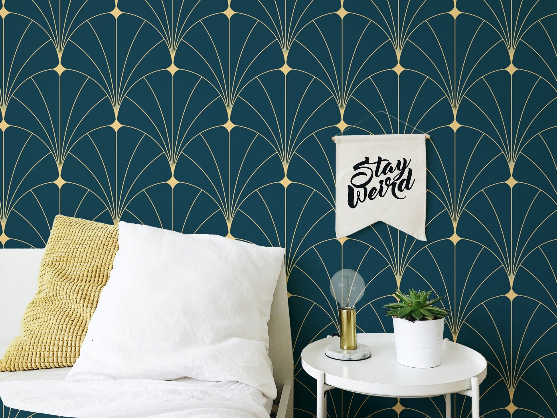 Dark Blue Color Abstract Art Deco Wallpaper behind a white bed with yellow accents.