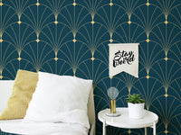 Dark Blue Color Abstract Art Deco Wallpaper behind a white bed with yellow accents.