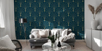 Gold arch pattern wallpaper behind a modern grey couch and glass coffee table.