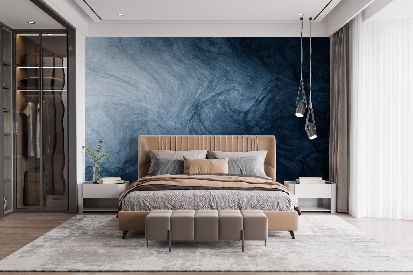Dark blue fluid texture wallpaper as a bedroom headboard feature.