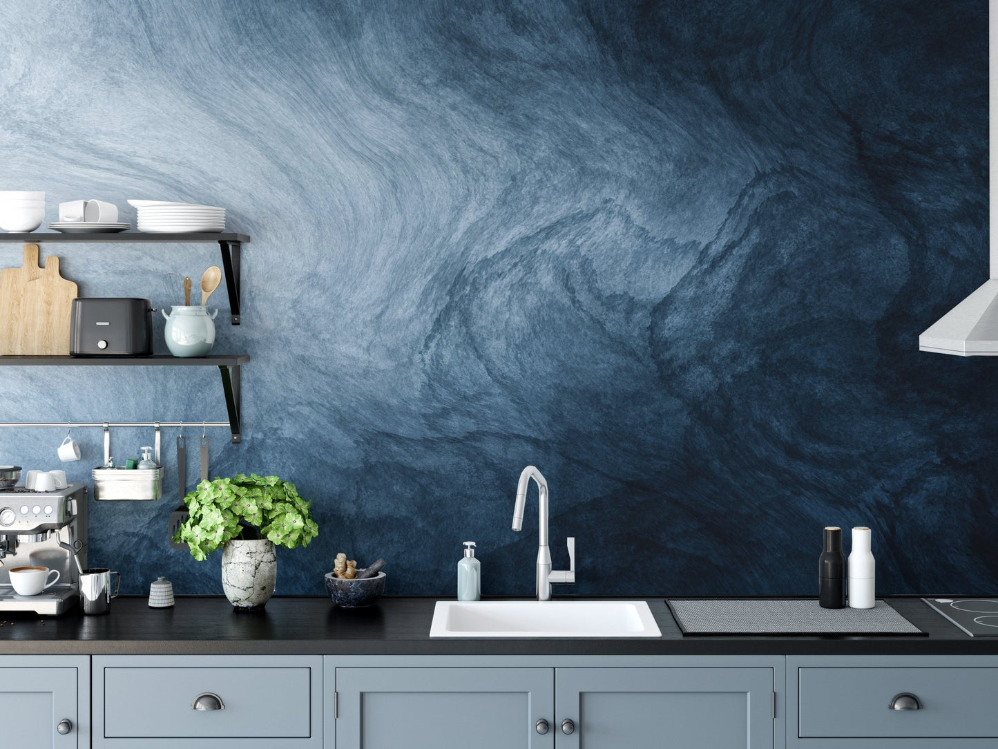 Fluid marble pattern wallpaper behind a contemporary kitchen counter.