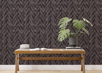 Living room accent wall with dark brown brick wallpaper and potted green plants.