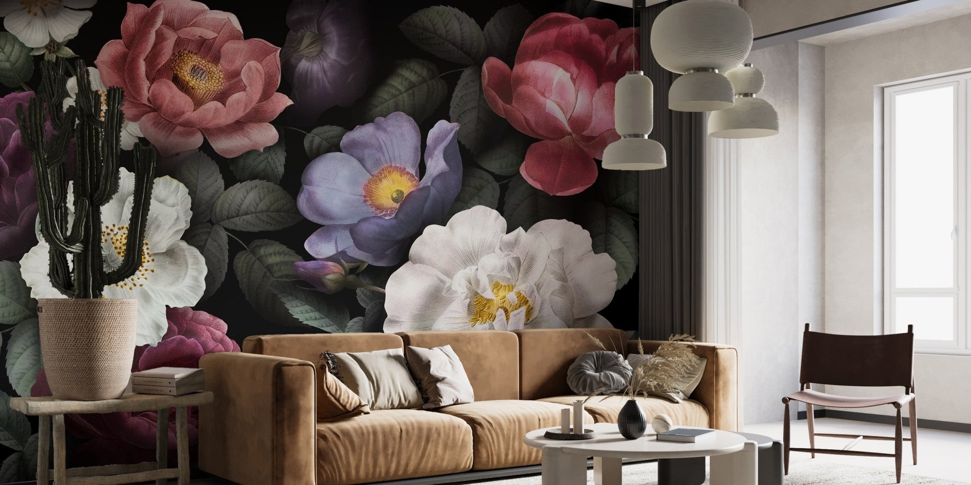 Dark botanical wall mural in living room with tan leather couch.