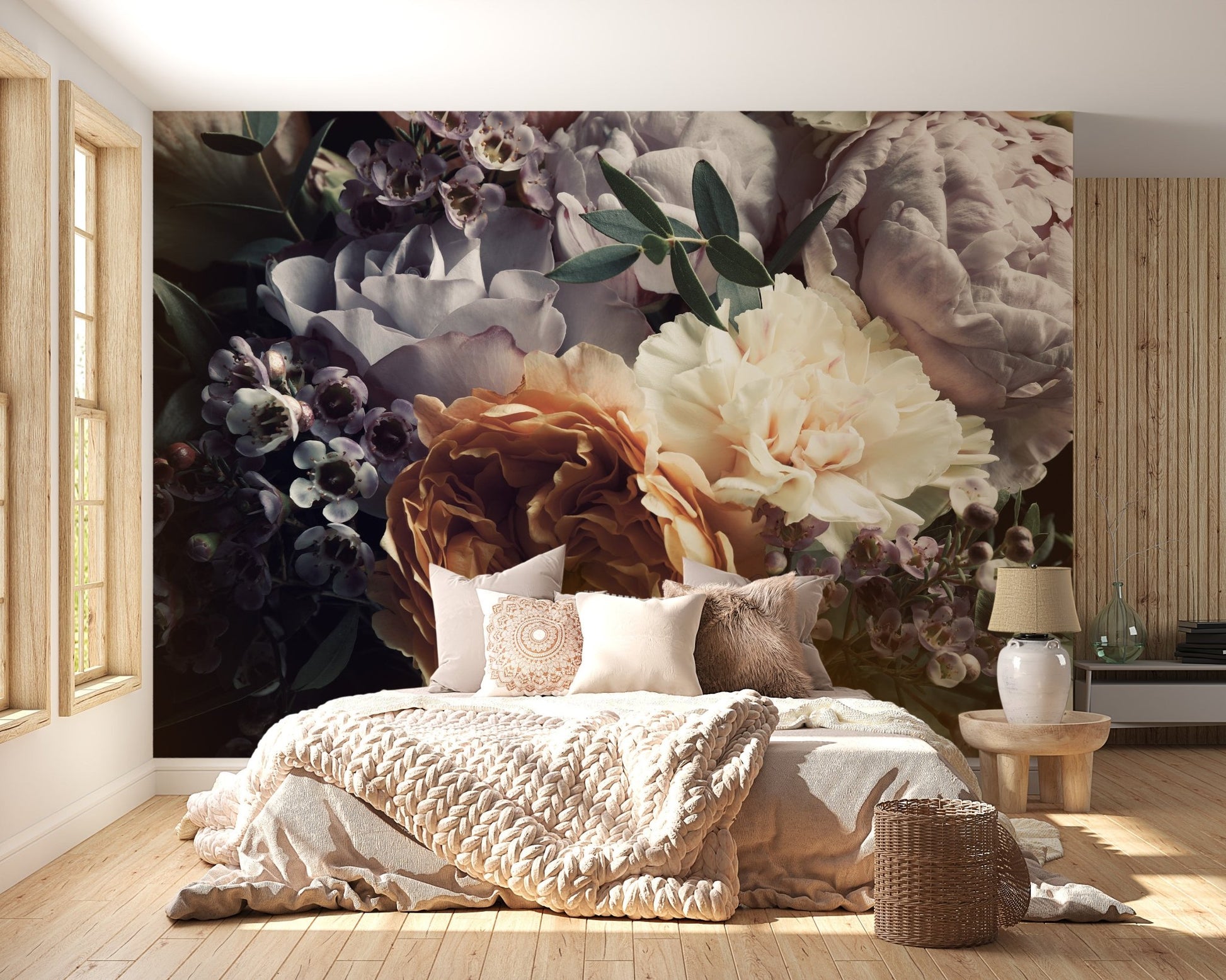 Sunlight hitting dark botanical wall mural in neutral bedroom.
