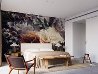 Modern bedroom with white bedding and dark floral botanical wall mural.