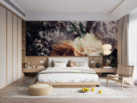 Minimalist bedroom featuring large dark botanical wall mural.