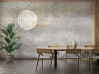 Dining area with wooden table and textured grey bird wall mural.