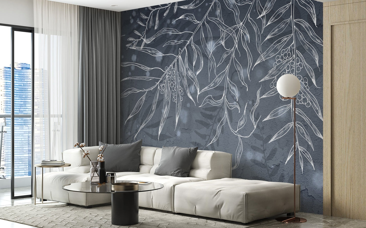 Charcoal gray wall mural with bird sketches in a living area with a sofa.