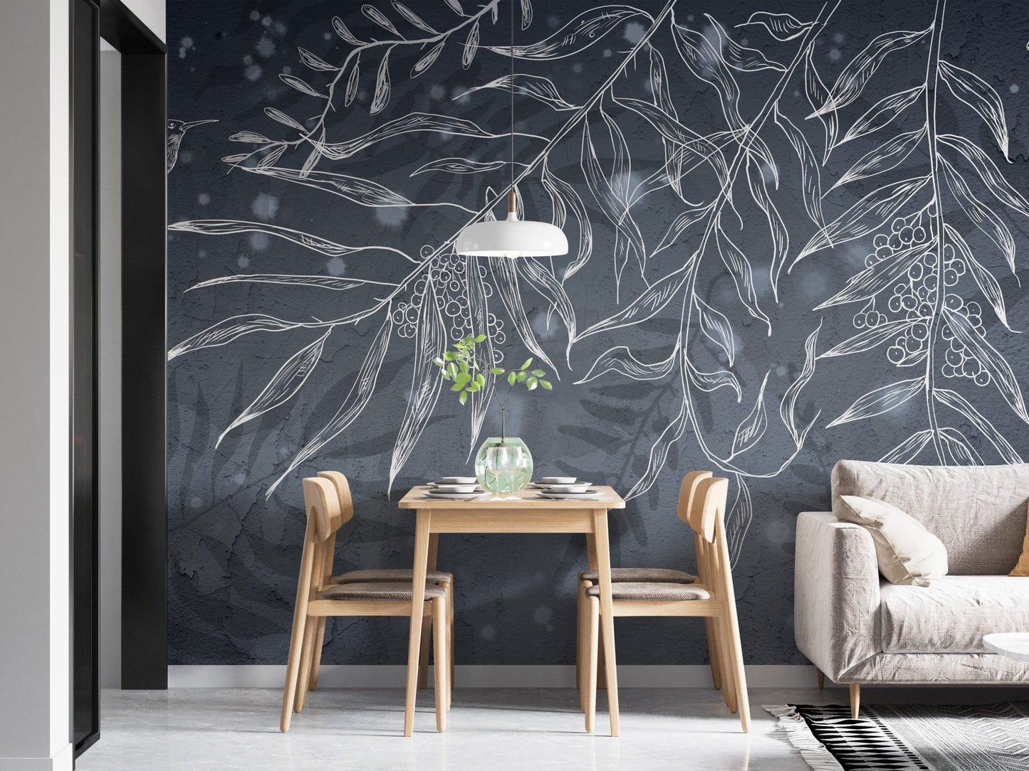 Leafy shadow wall mural in a minimalist dining area with light wood furniture.