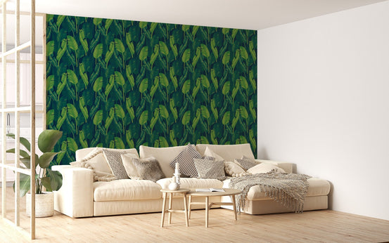 Tropical leaves themed wallpaper in a serene living room setting.