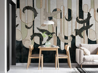 Small dining area wall mural with vertical geometric stripes and light wood chairs.