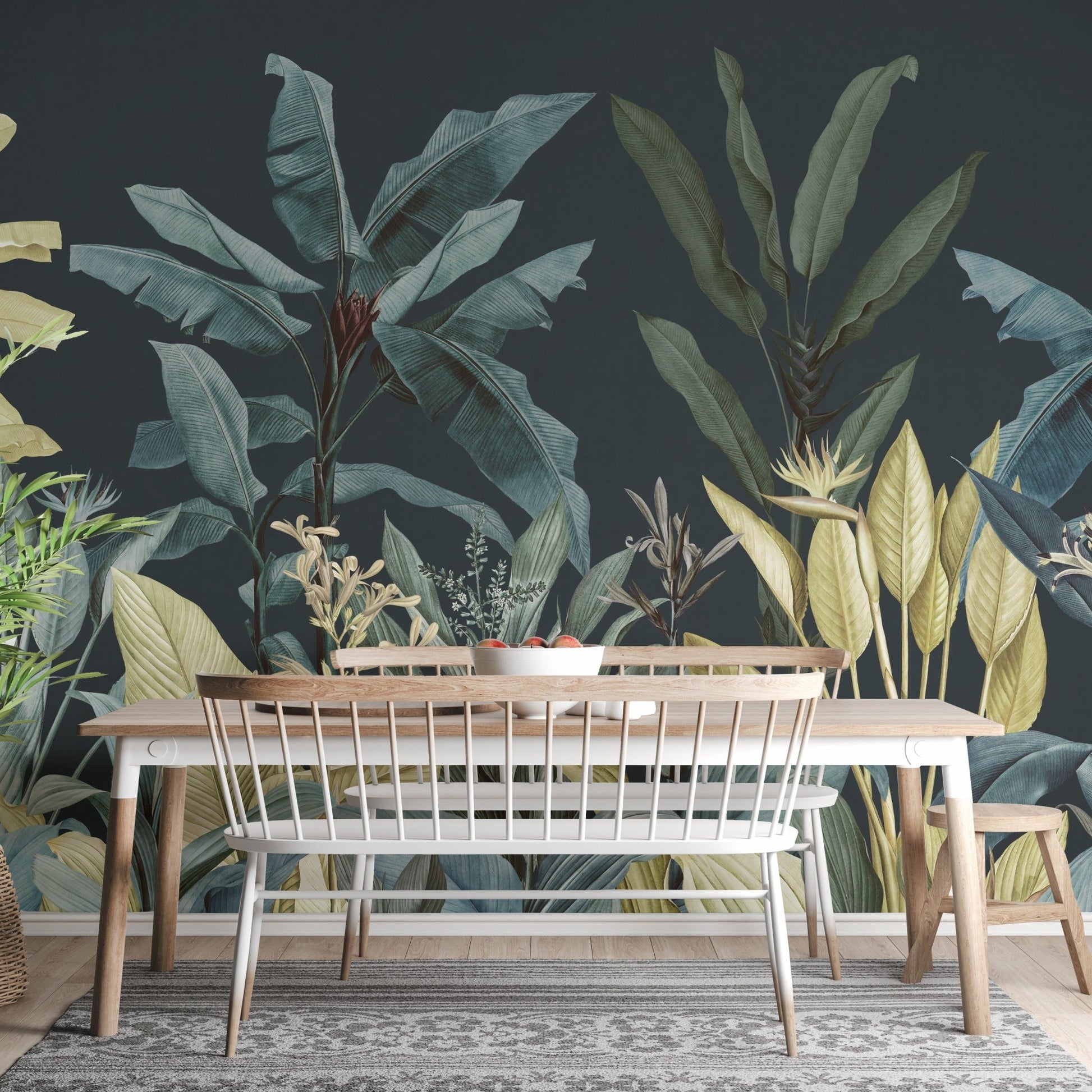 Tropical oasis wall mural in a dining room with a long wooden table and bench.