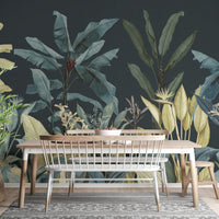 Tropical oasis wall mural in a dining room with a long wooden table and bench.
