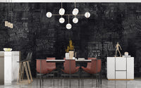 Textured black newspaper wall mural in a formal dining room.