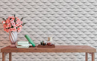 Decorative masonry interior abstract 3d white color wallpaper behind pink flowers.
