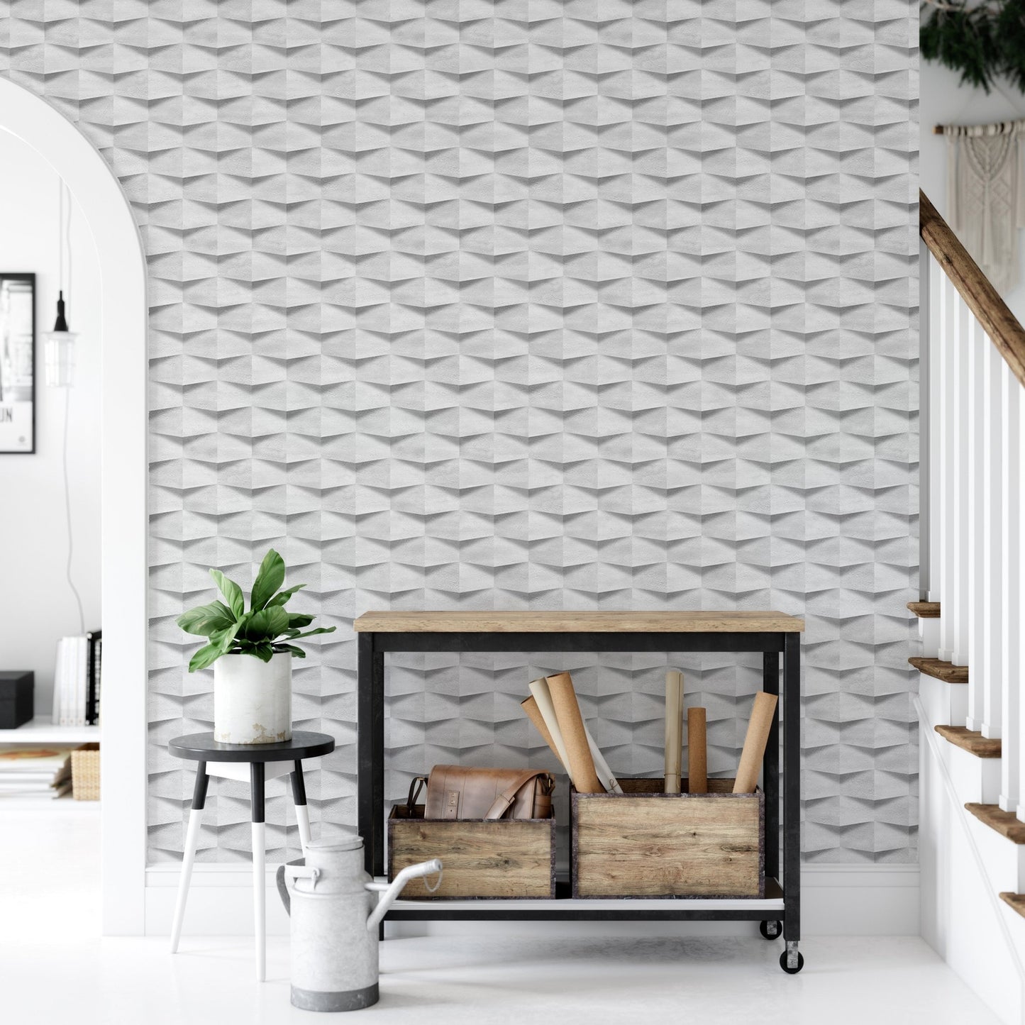 Entryway with a white watering can and plants against a textured 3D wallpaper.