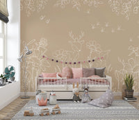 Nursery interior showing a white bed and deer doodle patterned wall mural.