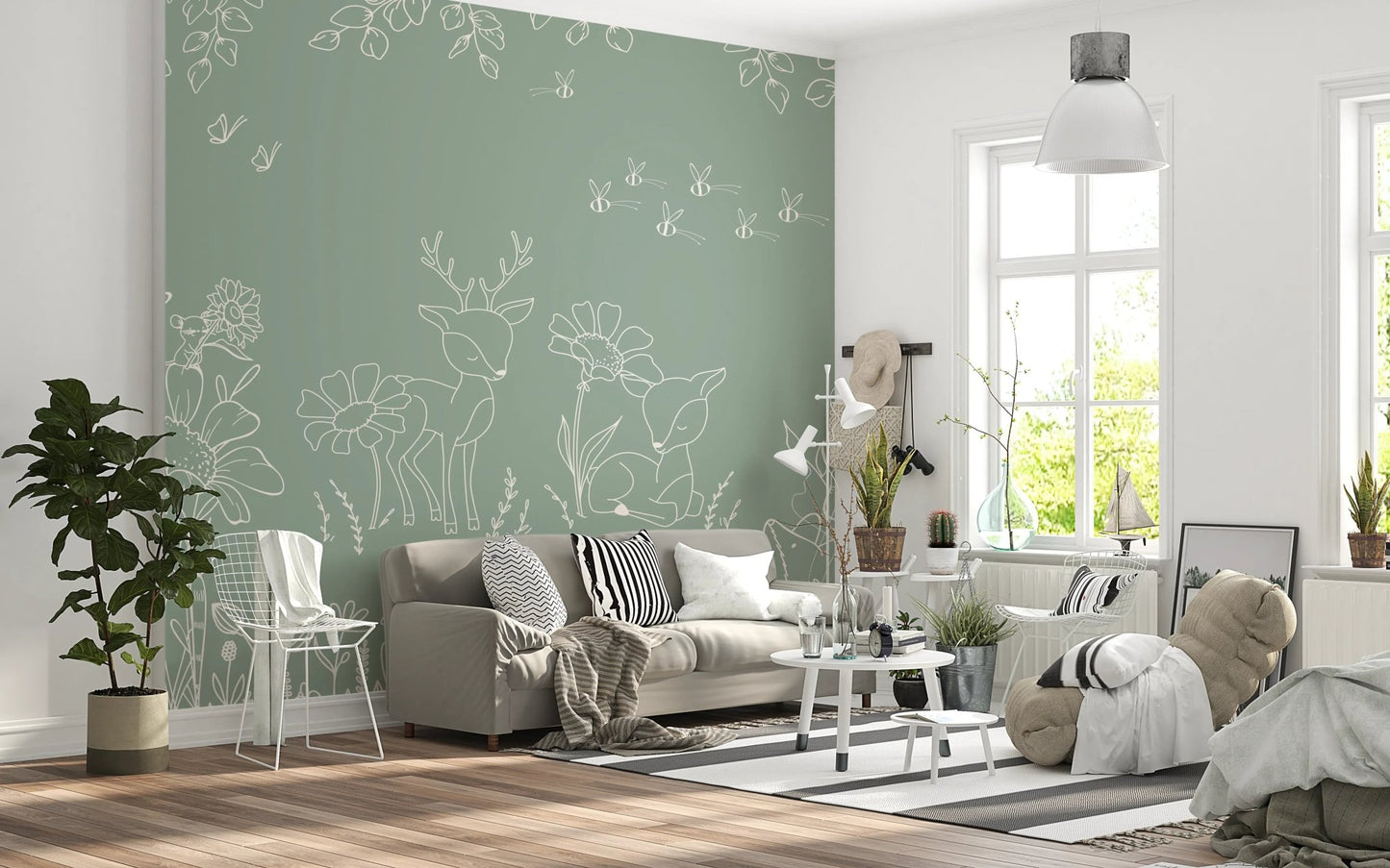 Soft green wall mural with botanical doodles behind a modern grey sofa set.