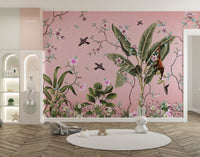 Pink botanical floral wall mural for a play area with a round white rug.