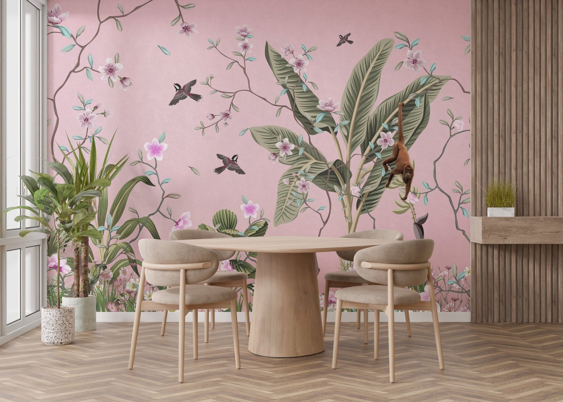 Pink floral dining room wall mural with banana leaves and monkeys around a wooden table.