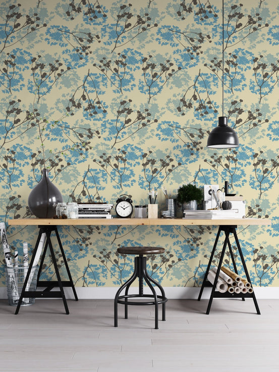 Blue botanical prints on cream delicate floral wallpaper mural.