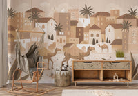 Kids playroom with Desert Dreams Mono Wall Mural featuring camels and palm trees.