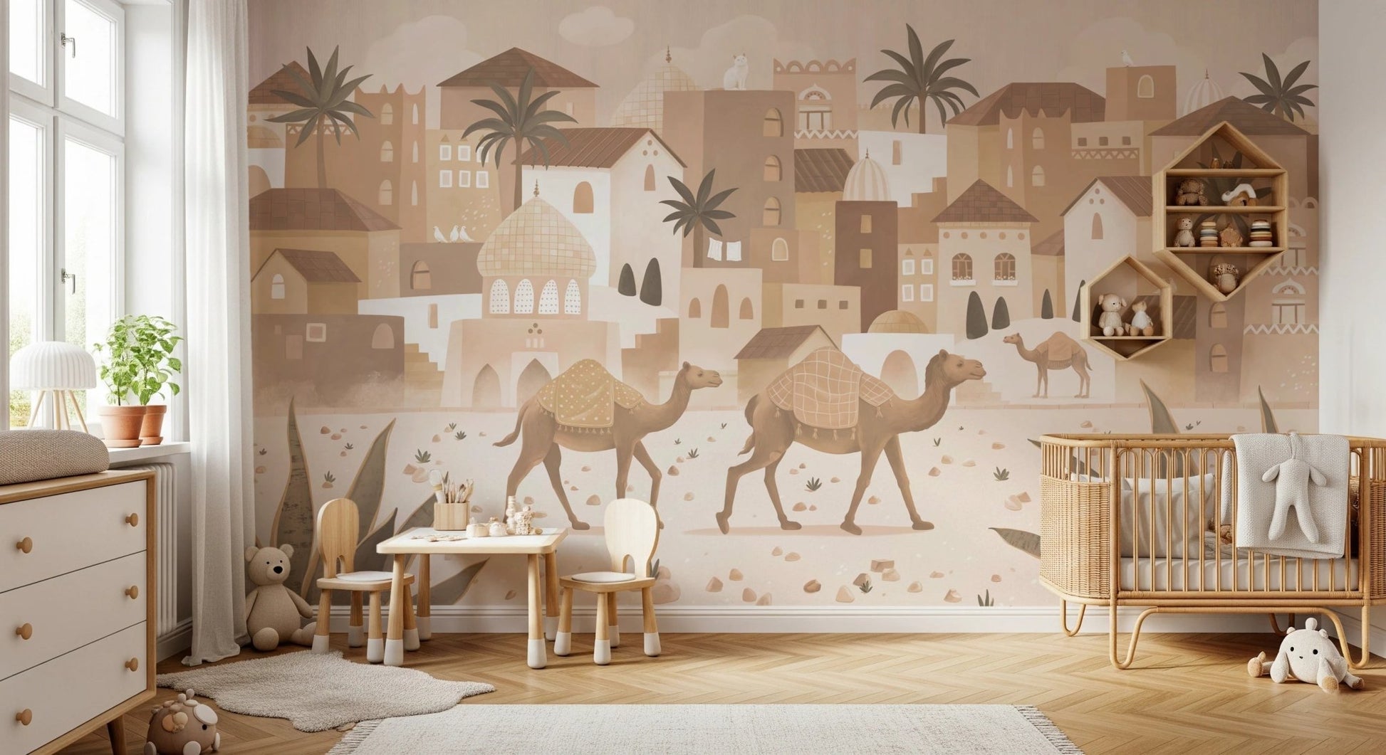 Minimalist toddler room featuring a desert landscape wall mural with sand-colored houses.