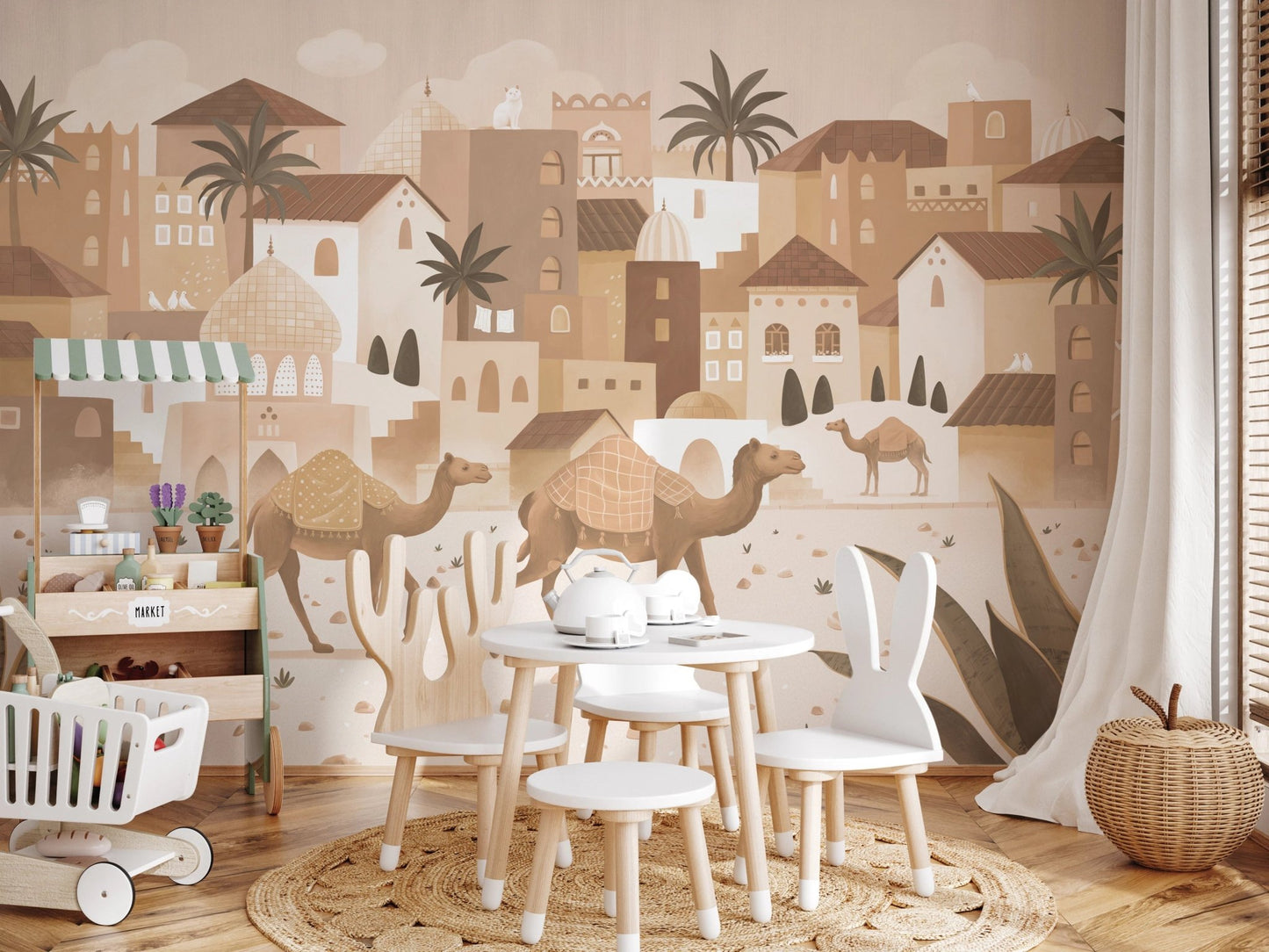 Nursery room with Desert Dreams Mono Wall Mural and a small white activity table.