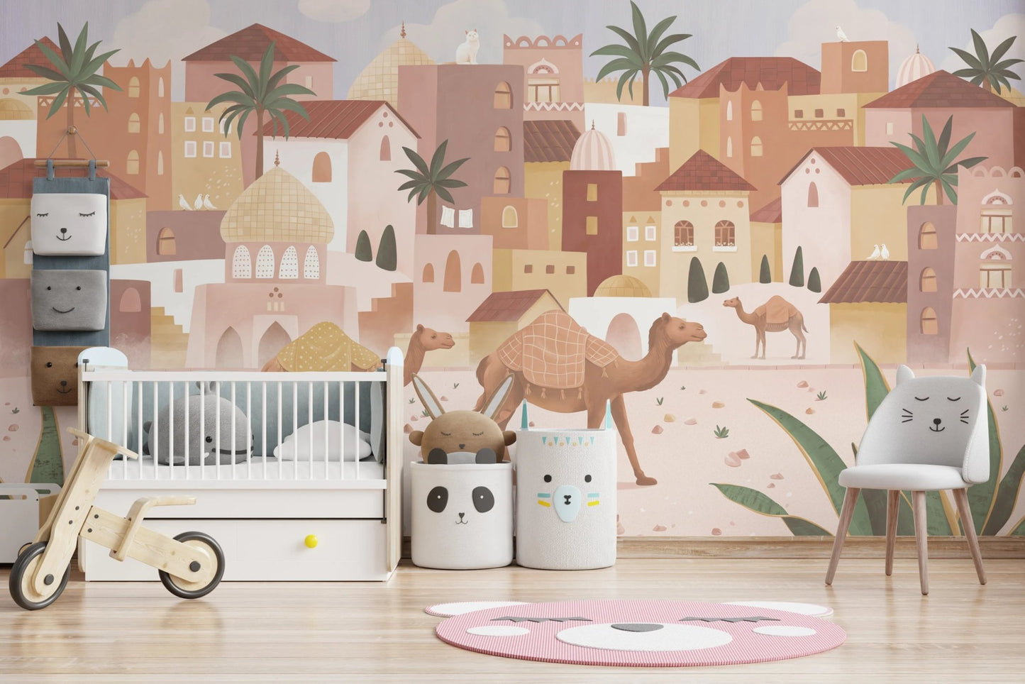 Kids' room featuring a desert print wall mural and neutral furniture.