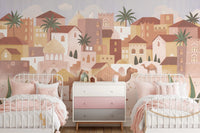 Twin bedroom wall mural with desert town scenery and a pink storage cabinet.
