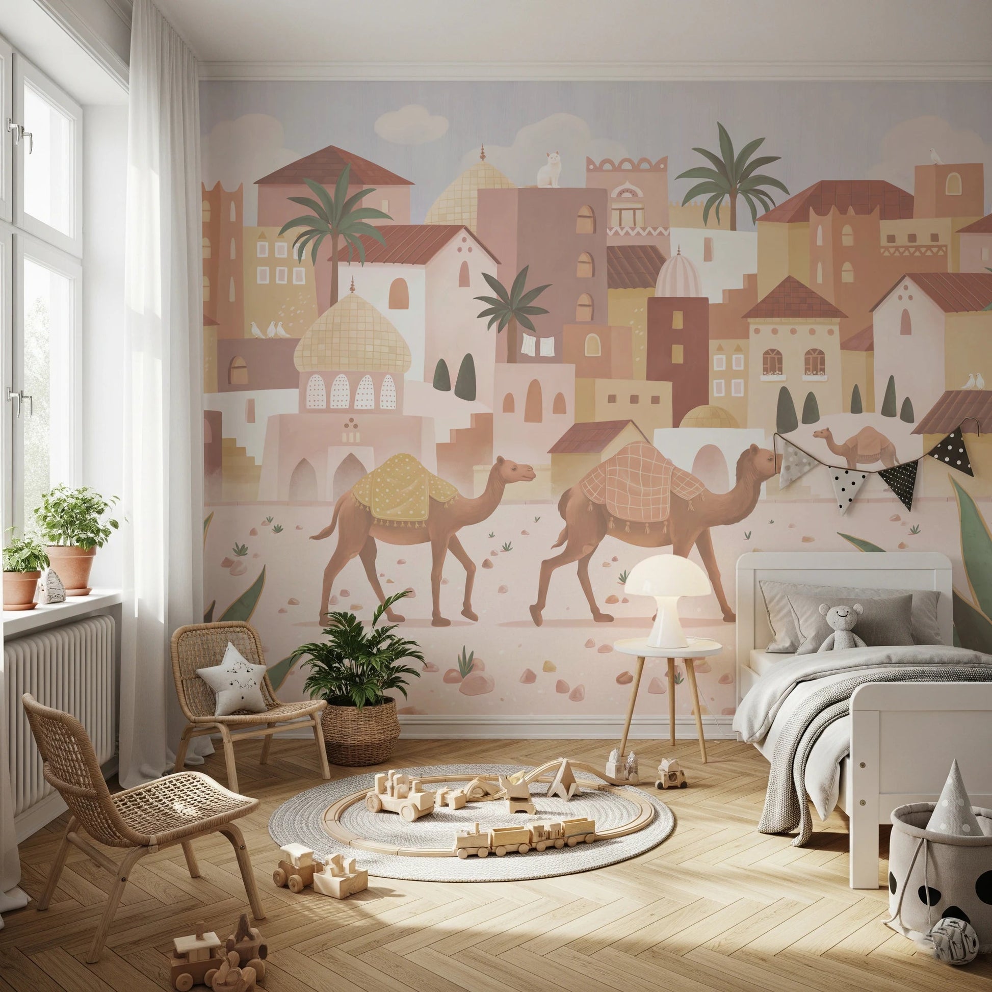 Desert Dreams wall mural showcasing camels and terracotta houses in a bright bedroom.