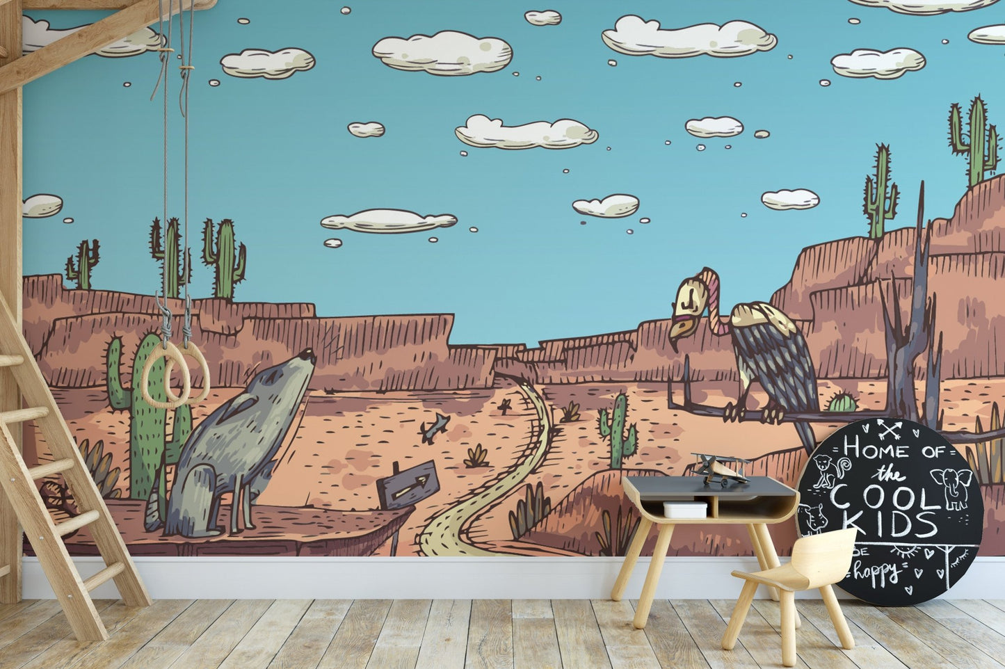 Vibrant desert mural featuring safari animals and landscapes in kids creative space.
