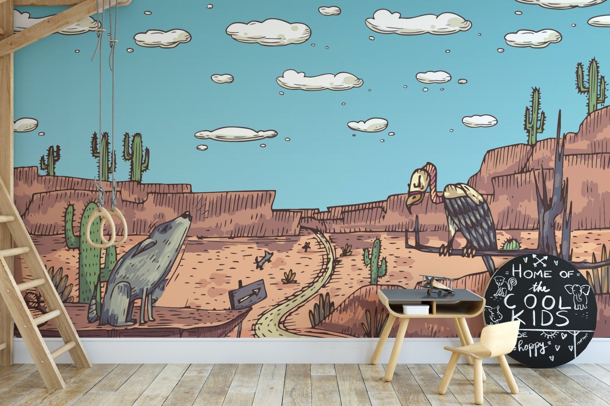 Vibrant desert mural featuring safari animals and landscapes in kids creative space.
