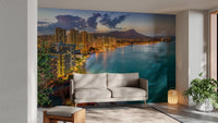 Tropical sunset shoreline wall mural with volcano skyline view from living area.