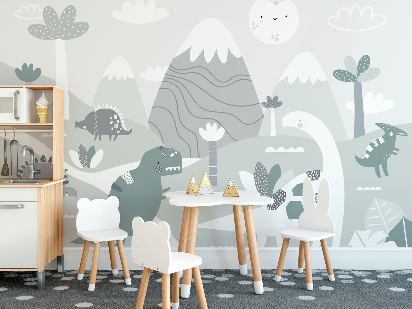 Kids dining area featuring dinosaur wall mural and a small wooden table set.