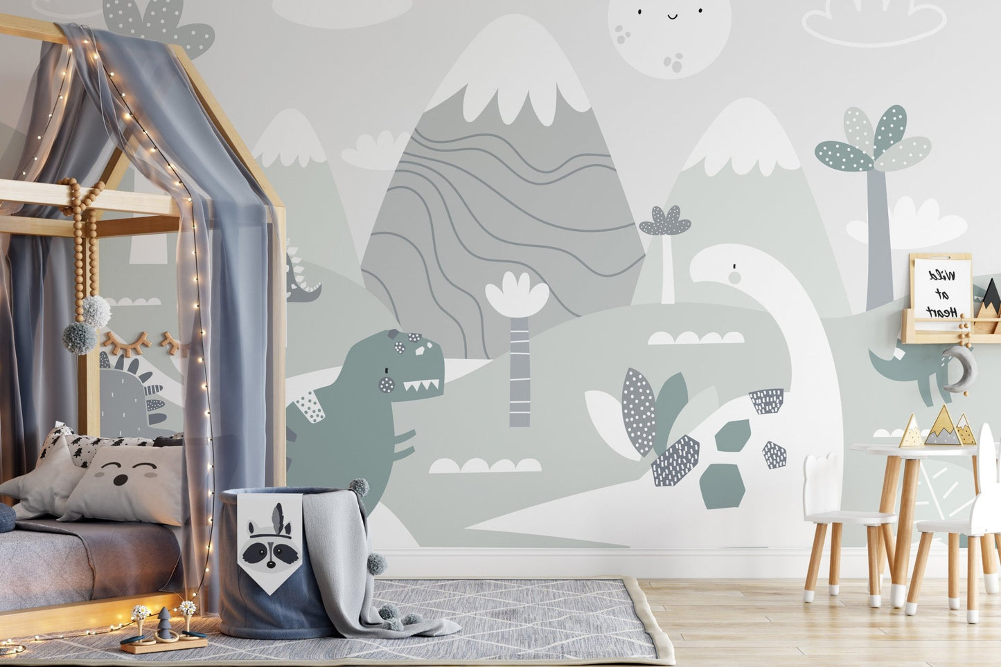 Cartoon dinosaur wall mural with a house-shaped bed frame and grey rug.