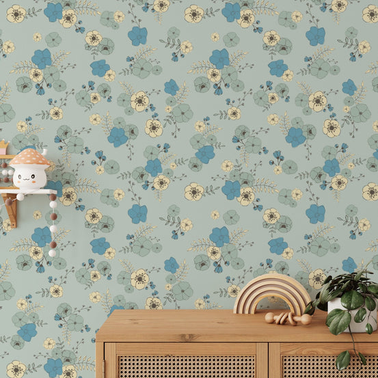 Seamless ditsy blooms pastel blue wallpaper with a gentle repeating print.