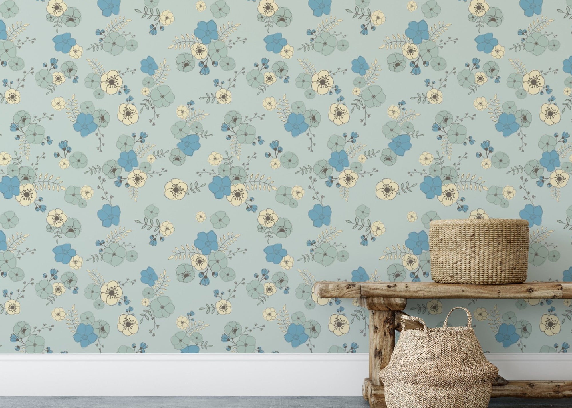 Ditsy blooms pastel blue wallpaper with delicate blue and cream floral patterns.