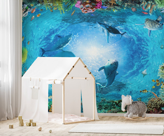 Kids bedroom featuring Dolphins Aqua Adventure wall mural with play tent.