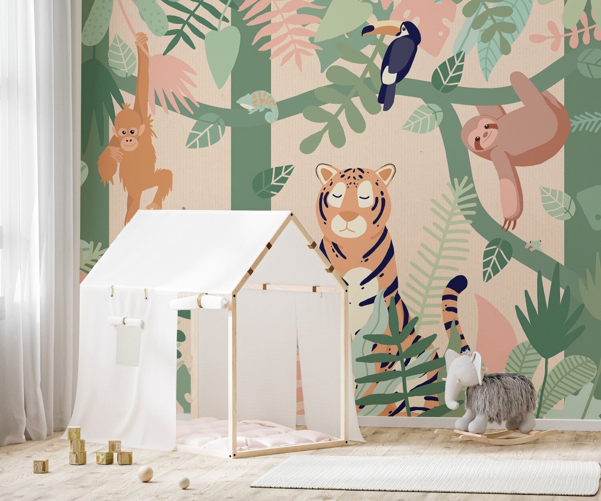 Forest animal wall mural with a white tent frame and neutral floor mat in kids room.