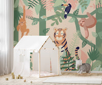 Forest animal wall mural with a white tent frame and neutral floor mat in kids room.