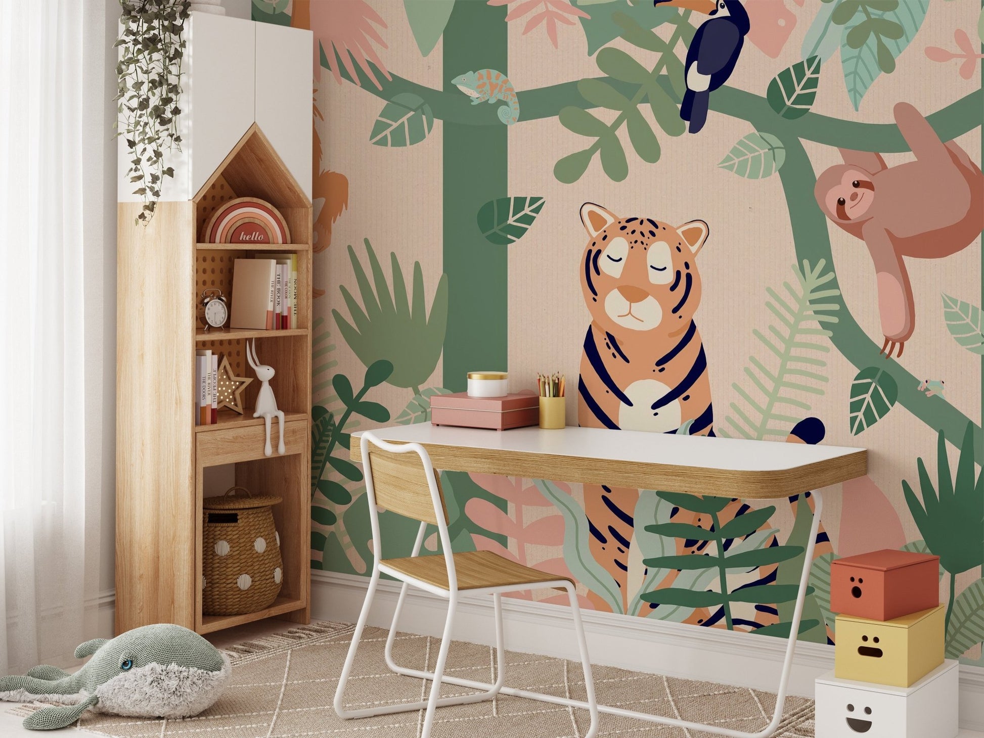 Tiger and sloth forest wall mural behind a study desk and white chair.


