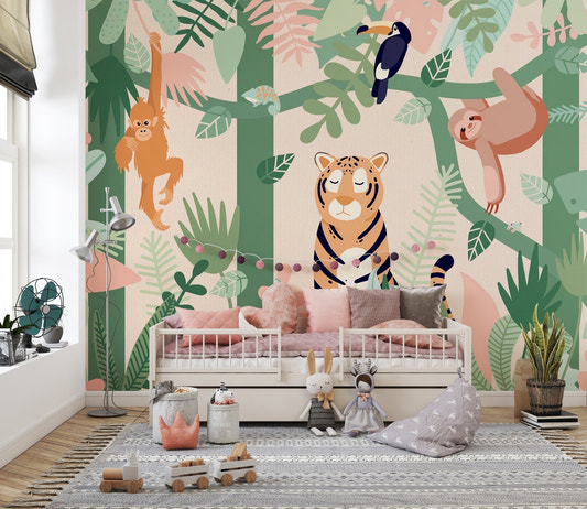Sleepy tiger and hanging monkey cartoon wall mural behind a white metal toddler bed. 