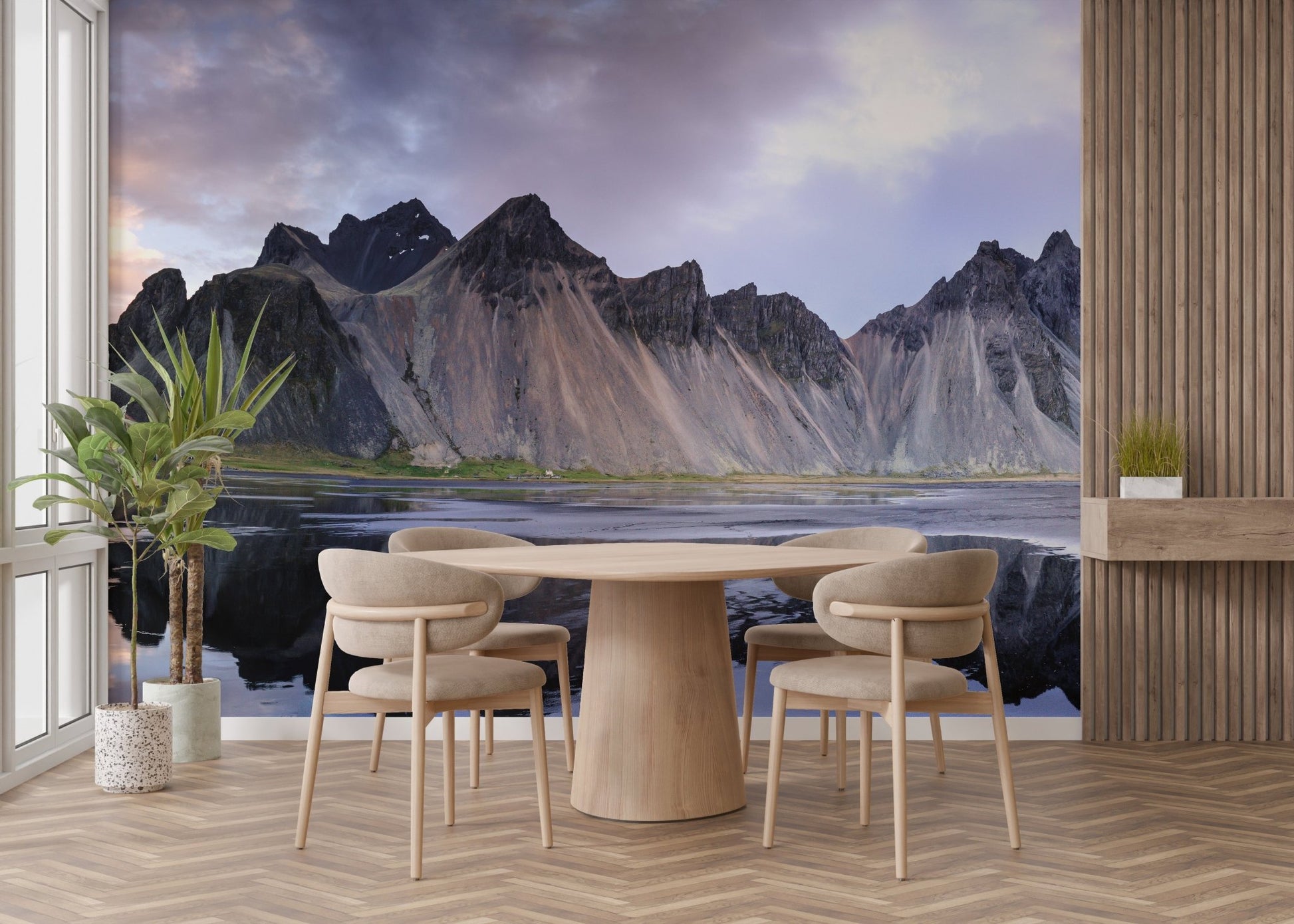 Stylish dining space with a dark-toned mountain landscape wall mural.