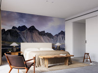 Elegant bedroom decor featuring a landscape-themed wall mural.