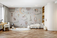 Nursery wall decor featuring soft clouds and circus tent details.